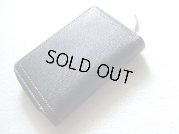 画像3: 【訳あり】【値下げ】レディースワンポイントデザインがスタイリッシュな合成皮革二つ折り財布 (3)